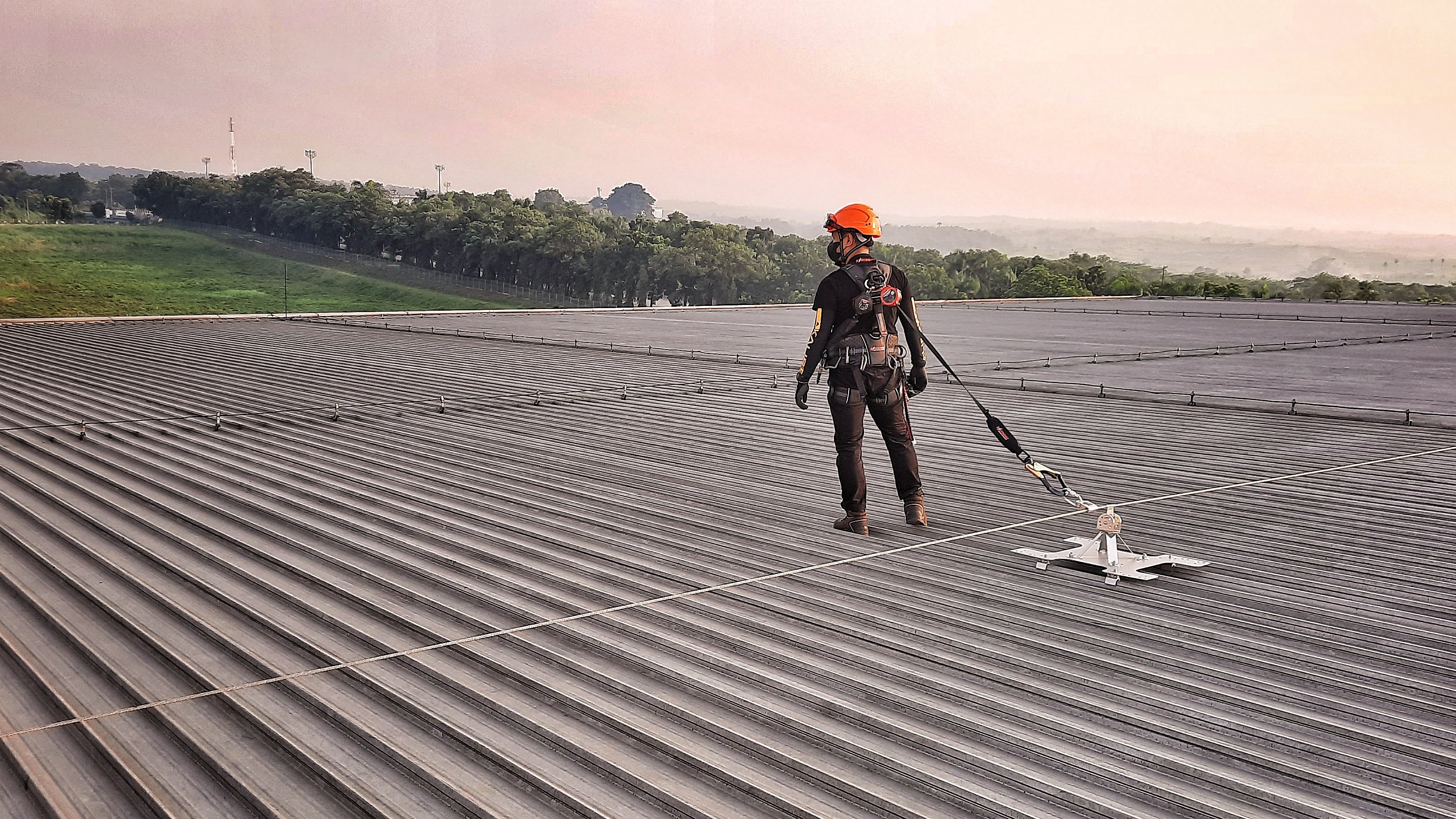 Adi on Roof with lifeline